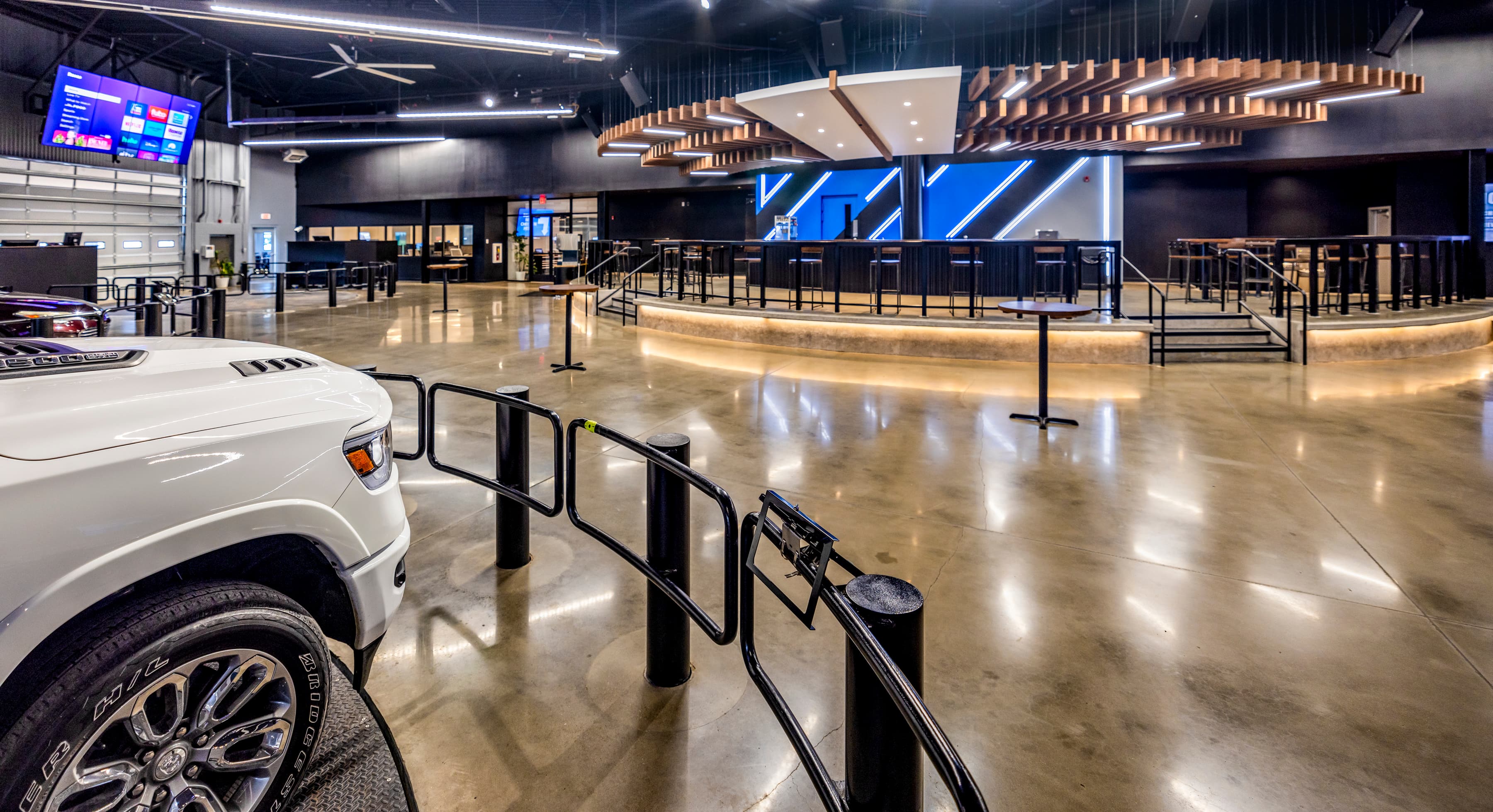 The UAX auction floor, turntable, wood flywheel above the bar